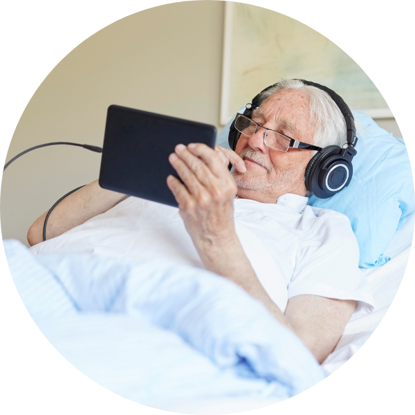 man listening to post-op music for pain managment