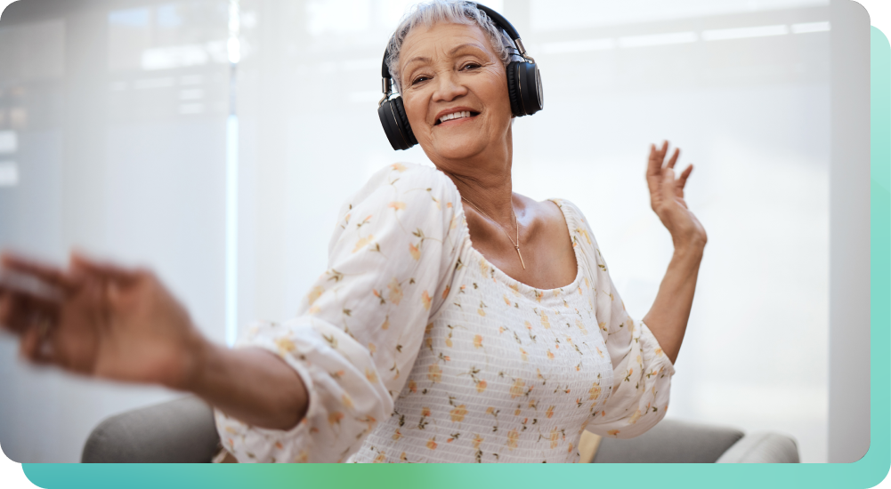 Woman dancing while wearing headphones