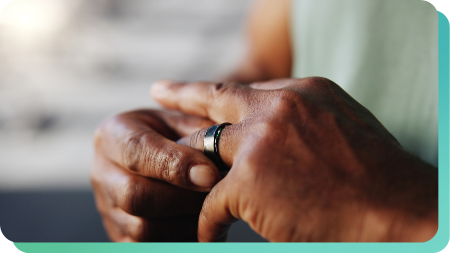Close up of hands with smart ring