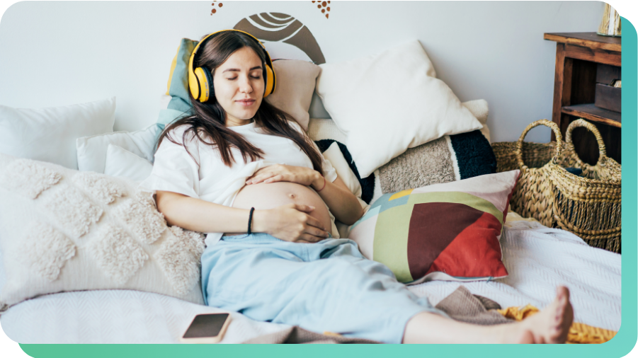 Pregnant woman listening to music and relaxing