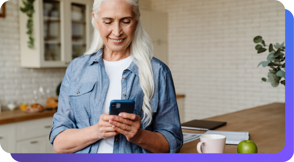 Woman smiling and looking at phone