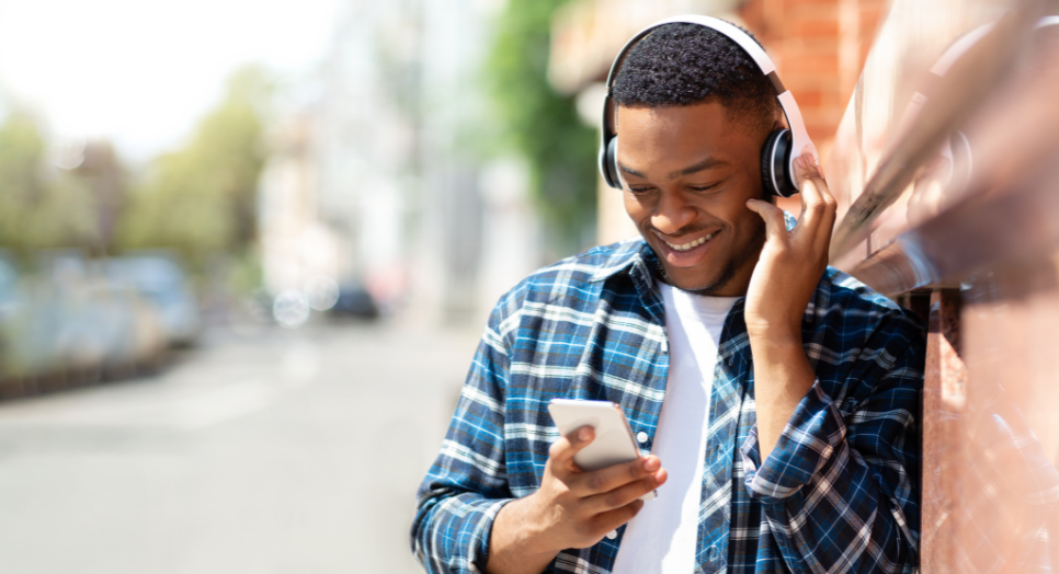 Man listening to Feed.fm Afrobeats music