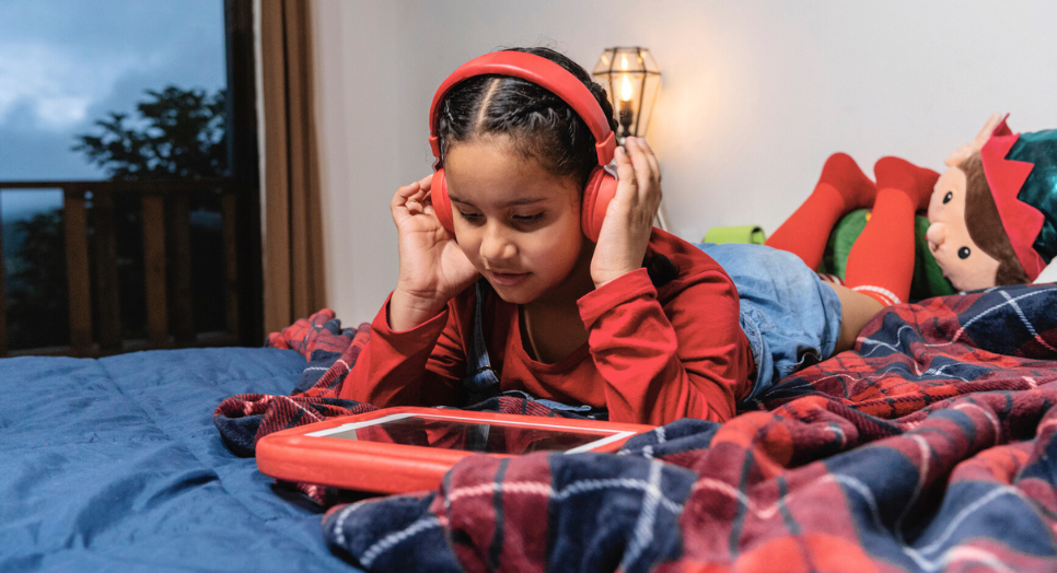 girl listening to family-friendly music clean music for apps